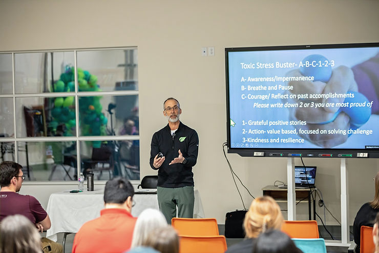 Rob Jetten providing health and wellness coaching in workplace session
